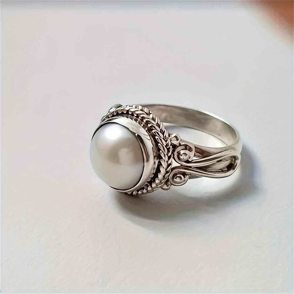 timeless vintage inspired faux pearl ring elegant statement jewelry. timeless vintage inspired faux pearl ring elegant statement jewelry.