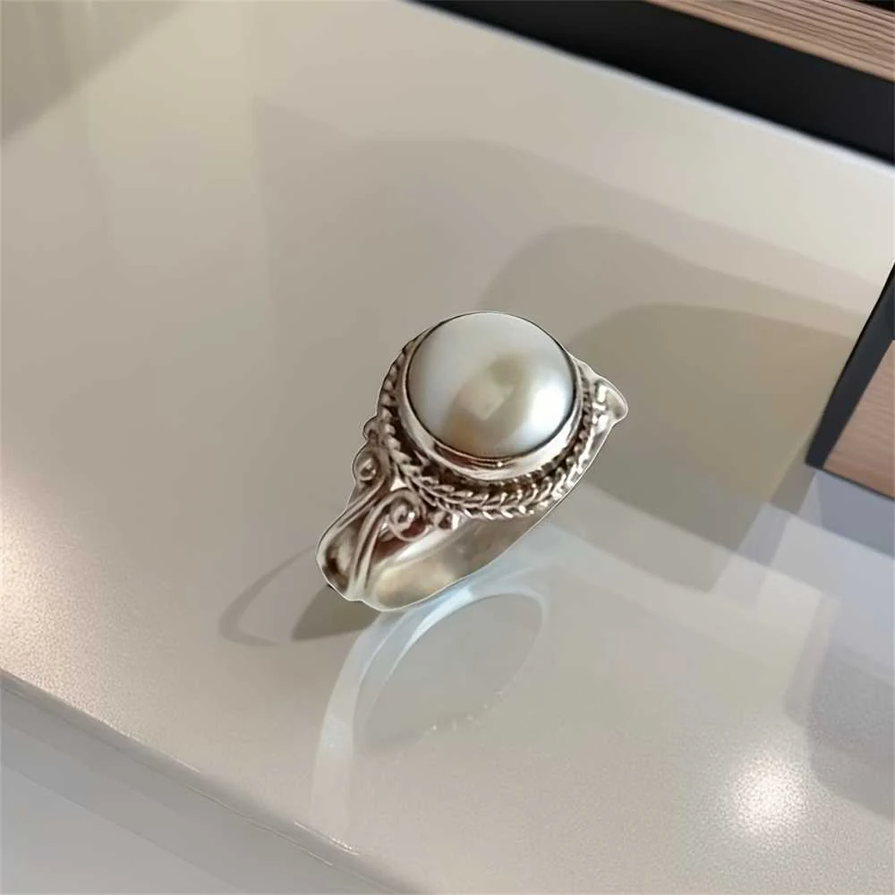 timeless vintage inspired faux pearl ring elegant statement jewelry. timeless vintage inspired faux pearl ring elegant statement jewelry.